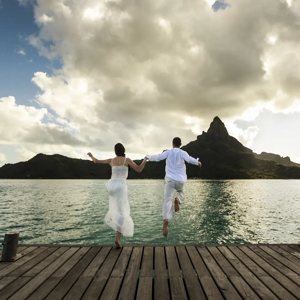 Newly Weds Jumping In Lake After Wedding